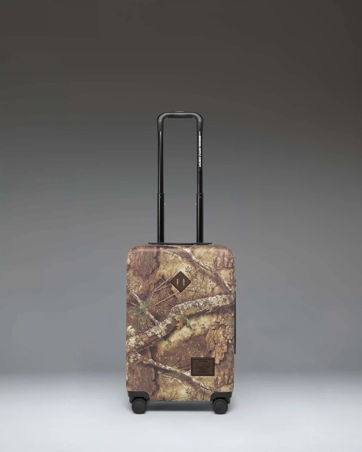 Realtree® Herschel Heritage™ Large CO Luggage